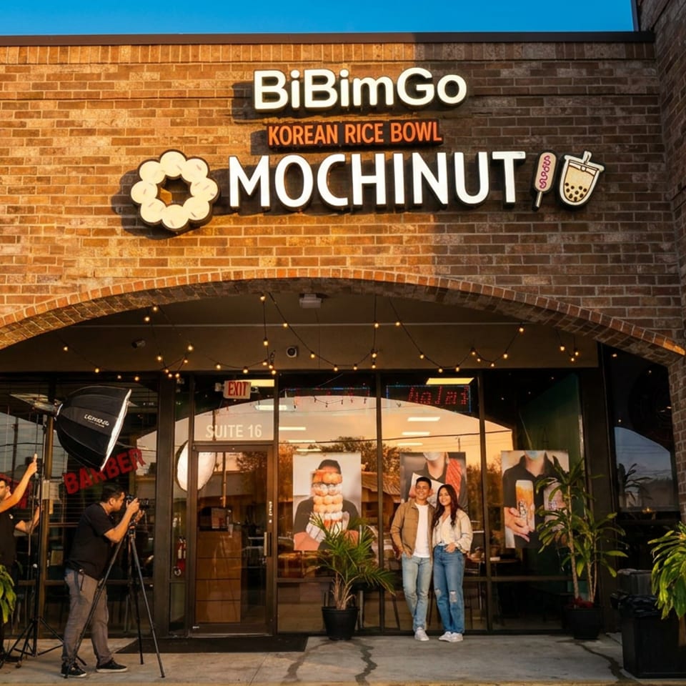 BiBimGo and Mochinut storefront with two photographers and a couple posing outside.